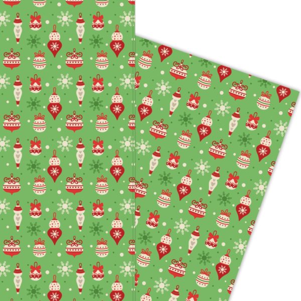 Fröhliches Weihnachts Geschenkpapier mit Weihnachtsschmuck auf grün