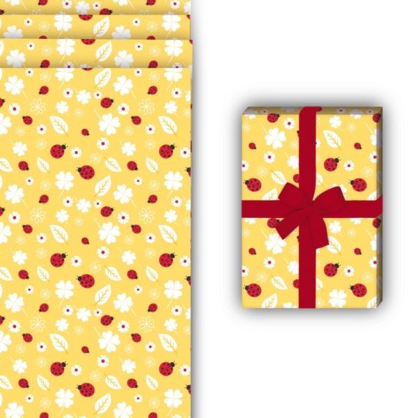 Glücks Geschenkverpackung: Glücks bringendes Geschenkpapier mit von Kartenkaufrausch in gelb
